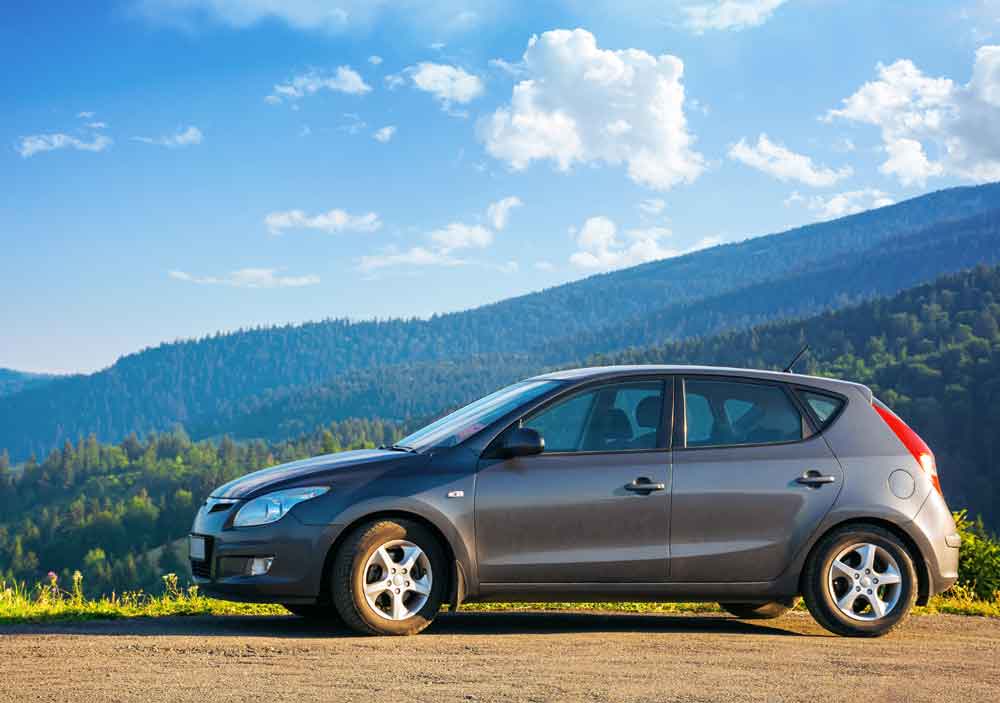 small gray car symbolizing auto repair